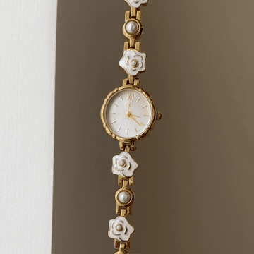 Vintage Floral Charm：White Round Dial Watch with Gold Round Bezel & Gold and White Alloy Floral Link Bracelet
