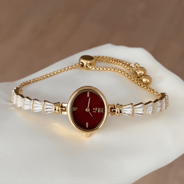 Passionate Red: Red Oval Dial Watch with Gold Oval Bezel & Gold Expandable Chain Bracelet