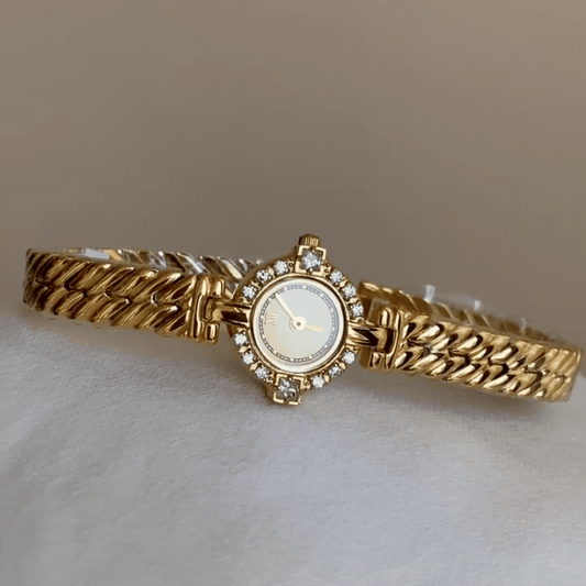 Diamond Accent：Gold Round Dial Watch with Gold Round Diamond Bezel & Gold Stainless Steel Link Bracelet