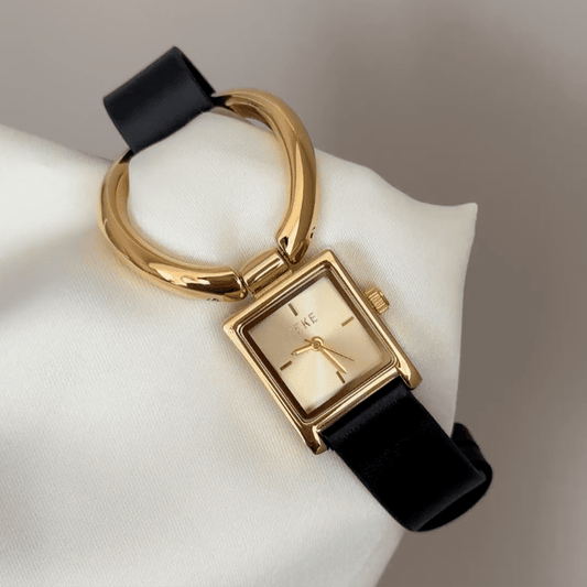 Modern Edge: Gold Rectangular Dial Watch with Gold Bezel & Black Leather Strap with Large Magnetic Circle Buckle