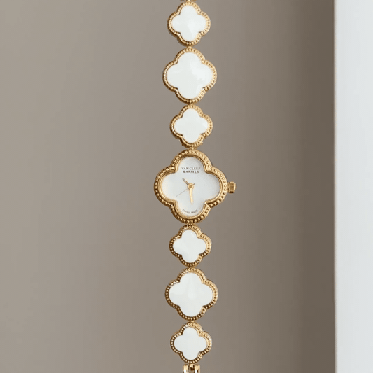 Feminine Grace: White Four-Leaf Clover Dial Watch with Gold Clover Bezel & Clover Link Bracelet