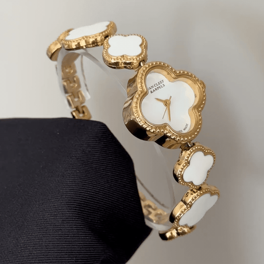 Feminine Grace: White Four-Leaf Clover Dial Watch with Gold Clover Bezel & Clover Link Bracelet