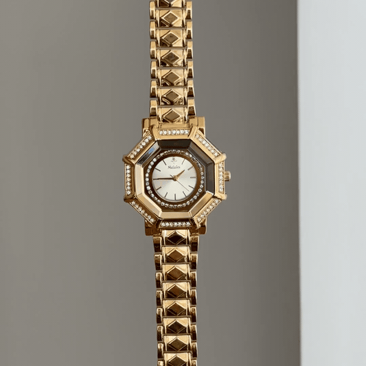 Geometric Glam: White Round Diamond Dial Watch with Gold Octagonal Diamond Bezel & Gold Bracelet