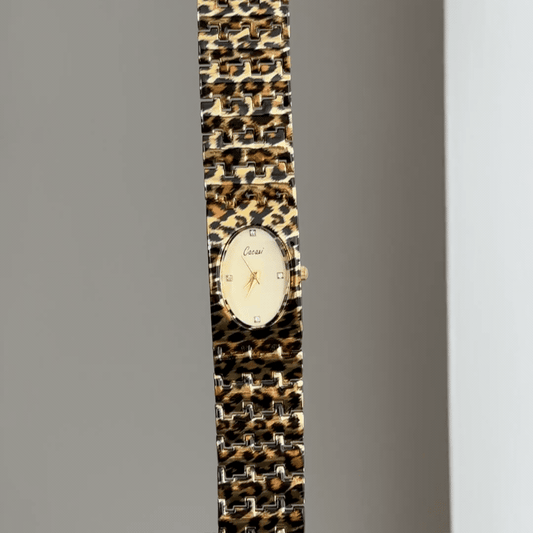 Geometric Artistry: Gold Oval Dial Watch with Brown Rectangular Bezel & Brown Stainless Steel Bracelet
