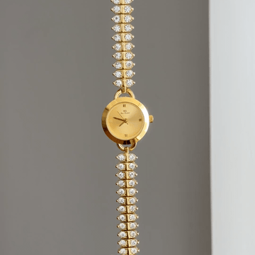 Diamond Sparkle: Gold Round Dial Watch with Gold Bezel & Diamond-Set Gold Chain Bracelet