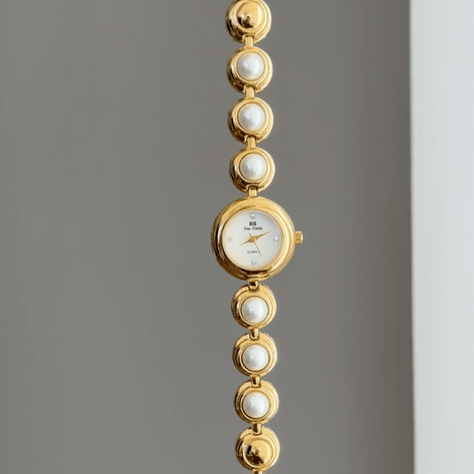Gilded Grace: White Round Dial Watch with Gold Bezel & Pearl-Set Gold Alloy Chain Bracelet