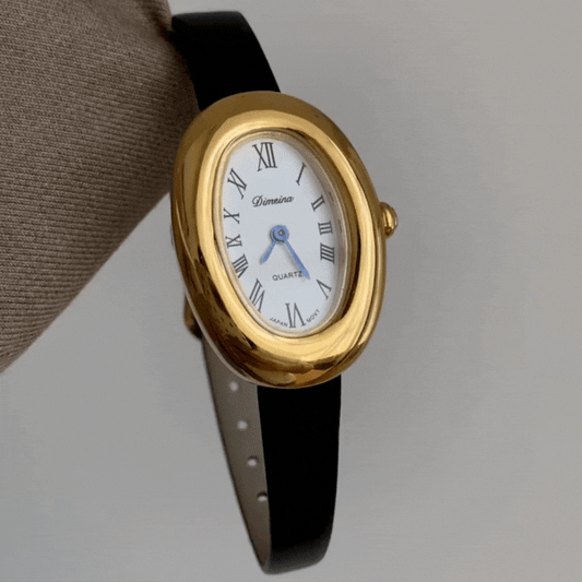 Golden Grace Timepiece: Oval Roman Numeral Dial with Black Strap