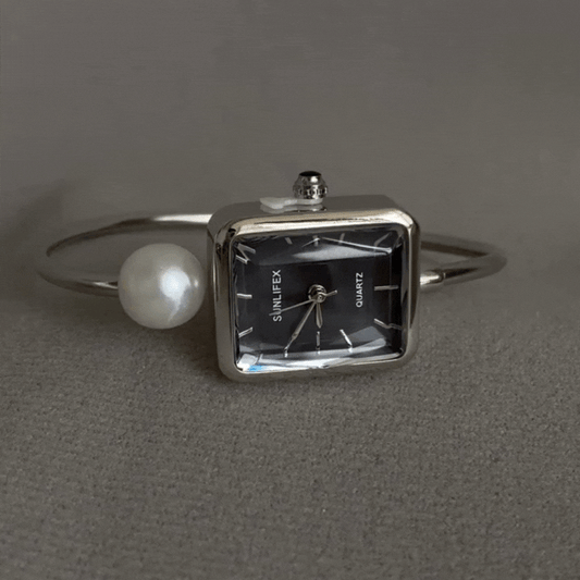 Noir Grace – Pearl-Set Silver Bangle Watch with Black Dial