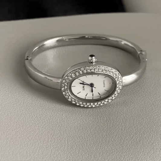Luna Bath – Silver Oval Bangle Watch with Crystal Detail
