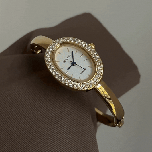 Luna Bath Gold – Oval Crystal Bangle Watch with White Face