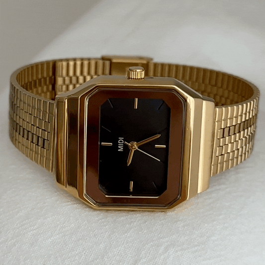 Luxury Women’s Quartz Watch – Gold Wide Strap with Black Rectangular Dial