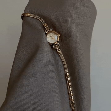 Aurora Pearl – Gold Bangle Mother-of-Pearl Dial Women’s Quartz Watch