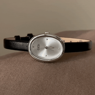 Noir Oval – Black Ultra-Slim Strap Silver Oval Mini Dial Women’s Quartz Watch