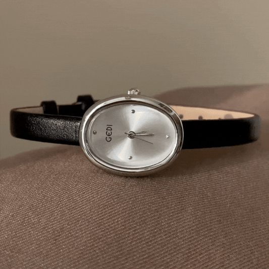 Noir Oval – Black Ultra-Slim Strap Silver Oval Mini Dial Women’s Quartz Watch