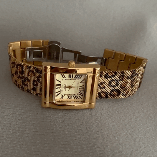 Vintage Glam Timepiece: Leopard Steel Band Gold Watch