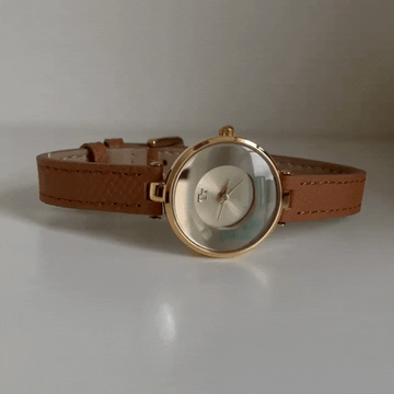 Amber Glow Timepiece: Brown Leather & Glass Dial Watch