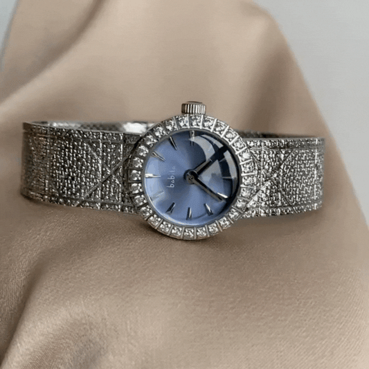 Icy Silver Bracelet with Blue Mother-of-Pearl Dial: Lady's Quartz Watch