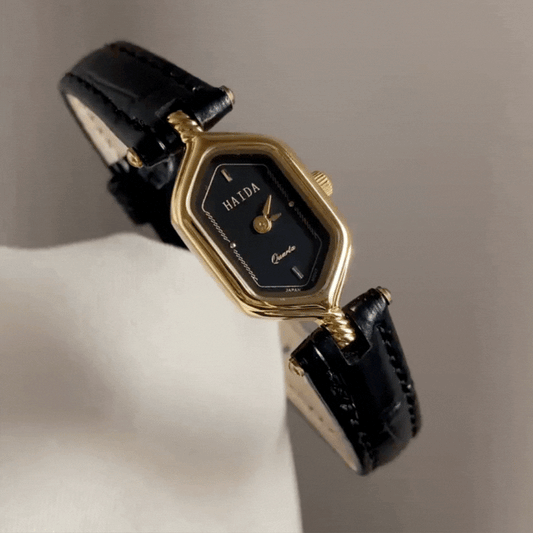 Vintage Gold Timepiece: Black Leather & Gold Case Quartz Watch