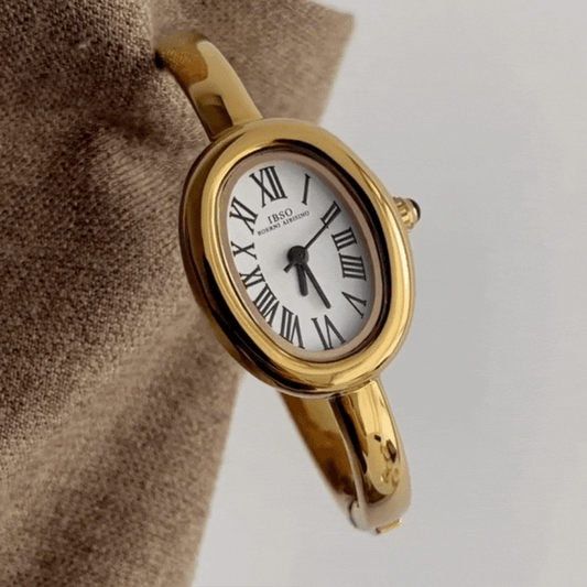 Gold Bangle Style with White Bathtub-Shaped Oval Dial Women’s Quartz Watch