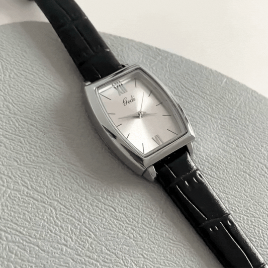 Executive Barrel Timepiece: Black Leather and Silver Case Watch