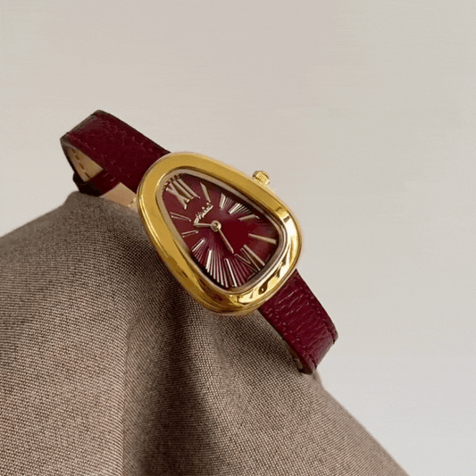 Crimson Elegance Timepiece: Gold and Burgundy Serpenti Watch
