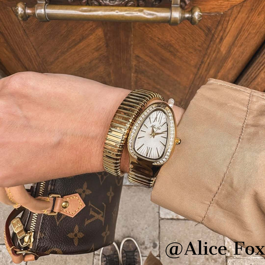 Golden Serpenti Bracelet Watch: Elastic Band with Diamond-Accented White Dial