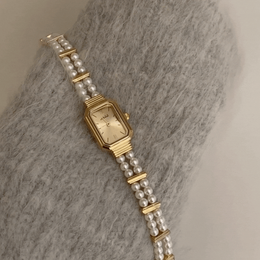 Parisian Pearl – Gold Rectangular Dial Women’s Quartz Watch with Elegant Pearl Bracelet Design