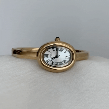 Gold Bangle Style with White Bathtub-Shaped Oval Dial Women’s Quartz Watch