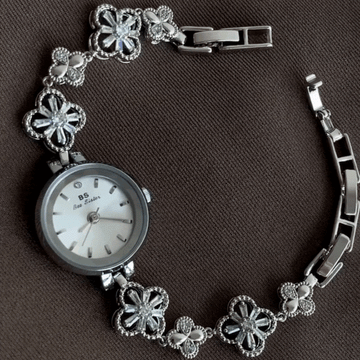 Elegant Silver-Tone Clover Design Round Dial Women's Watch