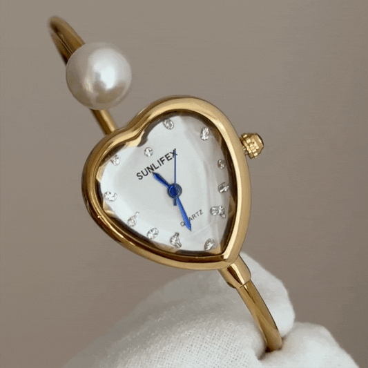 Elegant Women’s Quartz Watch – Gold Pearl-Embedded Bangle with Heart-Shaped White Dial, Jewelry-Inspired Luxury Style