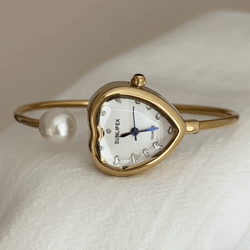 Elegant Women’s Quartz Watch – Gold Pearl-Embedded Bangle with Heart-Shaped White Dial, Jewelry-Inspired Luxury Style