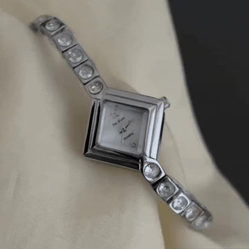 Silver Diamond-Accented Bracelet Watch with White Rhombus Dial – Elegant Quartz Watch for Lady