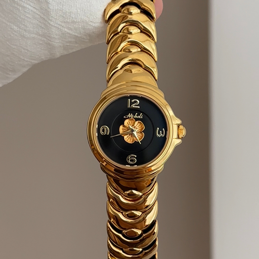 Fashion Women’s Quartz Watch – Gold Herringbone Bracelet with Black Camellia Dial, Elegant Floral Design