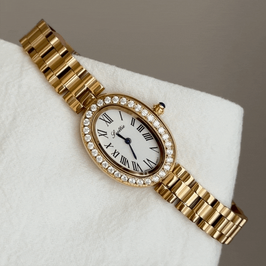 Elegant Women’s Quartz Watch – Gold Stainless Steel Bracelet with Diamond-Set Oval Case and White Dial