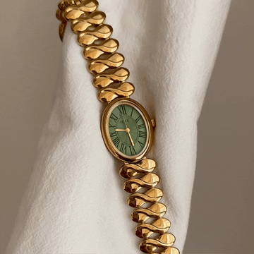 Elegant Women’s Quartz Watch – Gold Musical Note Bracelet with Oval Green Dial, Minimalist Luxury Style