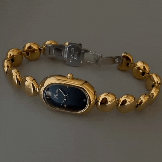 Gold Oval Black Dial Beaded Quartz Watch for Women – Elegant & Timeless
