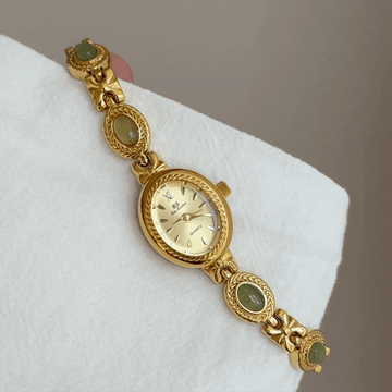 Montre à quartz pour femme avec bracelet en or et incrustations de jade vert