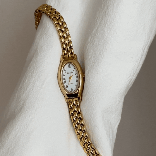 Elliptisk romersk ur: luxe vintage fransk guldur