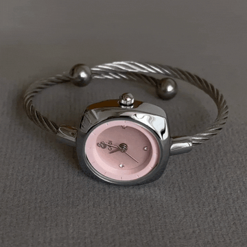 Montre à quartz pour femme avec bracelet gris argenté et cadran rose