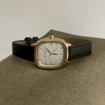 Obsidian Luxe Timepiece: Black and Gold Leather Watch