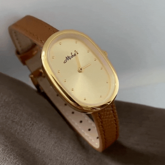 Amber Gold Timepiece: Oval Dial Leather Quartz Watch