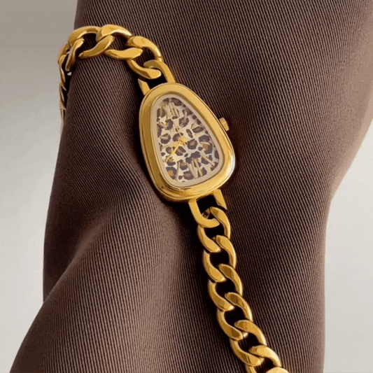 Serpenti Luxe – Gold Bracelet Watch with Leopard Face