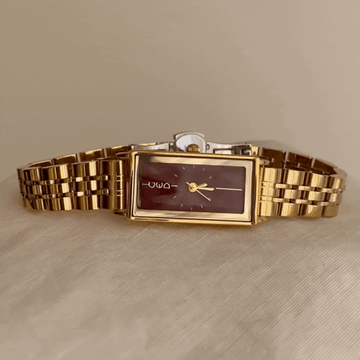 Rectángulo de lujo: correa de acero dorado y reloj de cuarzo de marcado rojo Angora