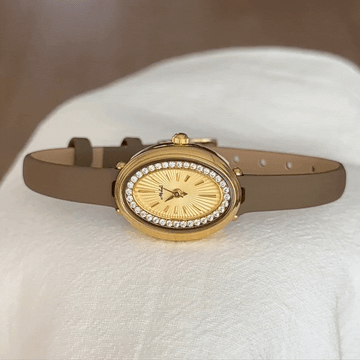 Elegant Women’s Quartz Watch – Elephant Grey Thin Leather Strap with Diamond-Accented Oval Gold Small Dial