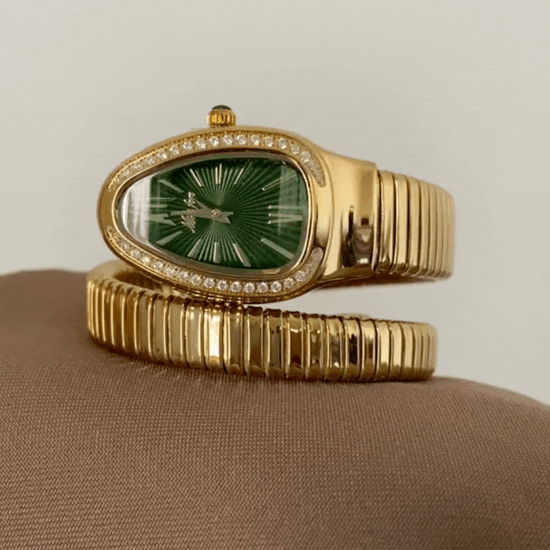 gold serpenti snake head watch green dial