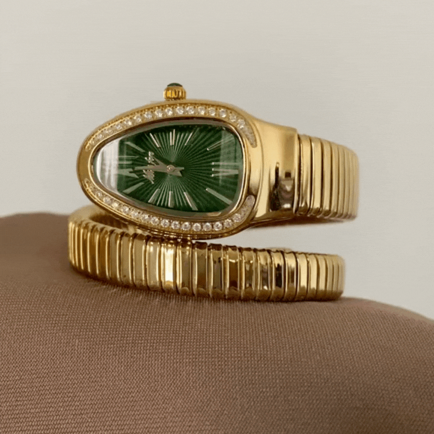 gold serpenti snake head watch green dial