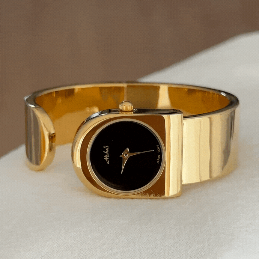 gold wide cuff watch black dial women  