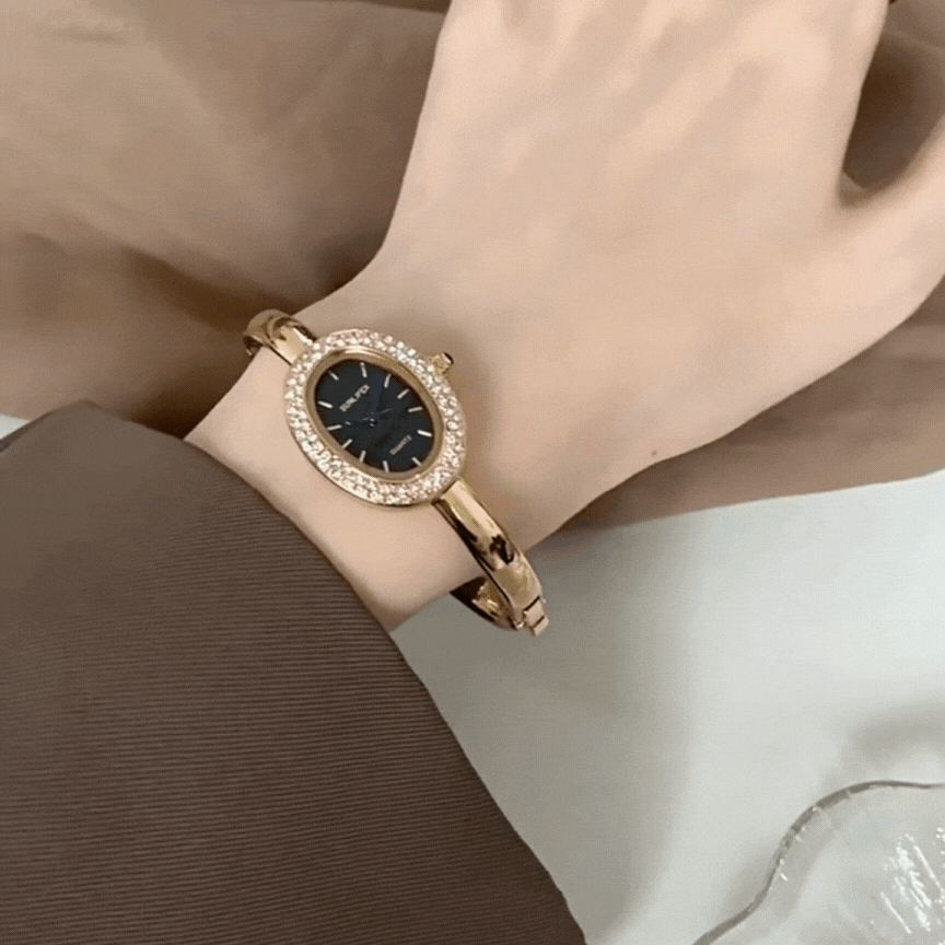 gold oval crystal bangle watch women  