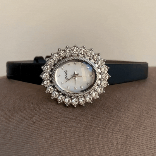 Soléa Vintage – Women’s Oval Mother-of-Pearl Watch with Sunburst Crystal Bezel & Black Leather Strap
