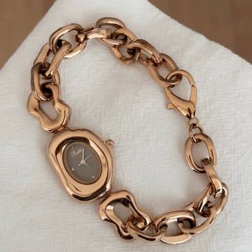 Elegant Vintage Ellipse Rose Gold Watch with Tonneau Case, Alloy Bracelet and Quartz Movement